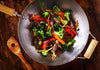 Asian Beef Stir Fry tender Asian Beef and Vegetable Stir-Fry is a delicious blend of savory and sweet flavors. Served with rice noodles and all coated in a healthy fat-free sesame sauce.