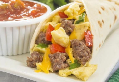 Breakfast Tacos. Our breakfast tacos are served on a flour tortilla topped with cage-free eggs, Monterrey Jack Cheese and sausage. Served with Picante sauce on the side.