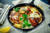 Cilantro Lemon Chicken - Low Carb.You and your family will love our juicy and full of flavor cilantro lemon chicken. Delicious marinated chicken thighs are roasted and served over seasonal vegetables. A light dish that everyone will enjoy. Low-Carb, Paleo and Keto friendly.