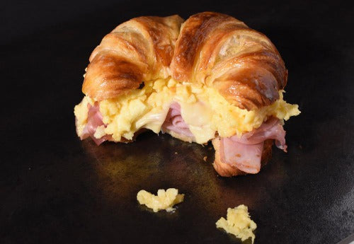 Breakfast Croissant Loaded with Ham, Eggs and Cheese
