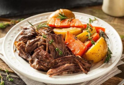 Homemade Pot Roast with Carrots and Potatoes. Two servings of our succulent homemade pot roast begins with premium chuck roast, slow braised in a classic blend of herbs and house seasoning. Served with carrots and red skin potatoes with savory beef stock gravy. A tender and juicy comfort food. Hearty meals delivered to your door.