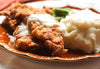 Fried Chicken with Mashed Potatoes.Simply "southern", yet healthy is how we described our oven baked crispy chicken. We brine our chicken breast then soak in buttermilk, lightly dredge in seasoned flour and pan fry in canola oil just to crisp the outside. We finish cooking in the oven and serve with homemade mashed potatoes and green beans. True Southern favorite meal!