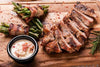 Tender grilled pork tenderloin is served with green bean bundles wrapped in bacon served with queso blanco on the side. Low carb, paleo, keto friendly. Healthy meals.
