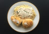 Chicken Cordon Bleu. Tender chicken breasts are rolled with swiss cheese and honey ham, battered in parmesan and panko pan fried, sliced and served over angel hair pasta with our delicious lemon chardonnay cream sauce.