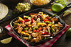 Chicken Fajitas Skillet - Low Carb. Our tender grilled chicken breast is seasoned with a blend of southwest seasoning, spices and our FFP house seasoning. This juicy chicken breast is accompanied by onion, green and red peppers. Served with corn and flour tortillas, tomatillo and red salsas.