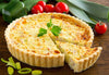 Bacon and Cheddar Quiche.You will love our homemade quiche.  Farm raised eggs, cream, nutmeg, cheddar cheese and bacon fill our homemade flaky crust.  A healthy and hearty start to your day!