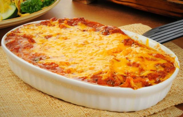 Taco Casserole - Low Carb. We cook our well seasoned ground beef, pico de gallo, cilantro with tomato sauce, and house seasoning. We add roasted corn and black beans, topped with monterey jack cheese and cheddar cheese. Low carb, paleo, keto friendly.
